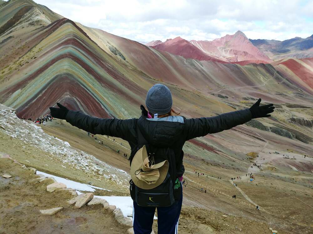 Making it to the top of Rainbow Mountain in Peru