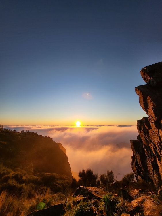 Pico do Arieiro lookout point with the sunrise on Madeira Island