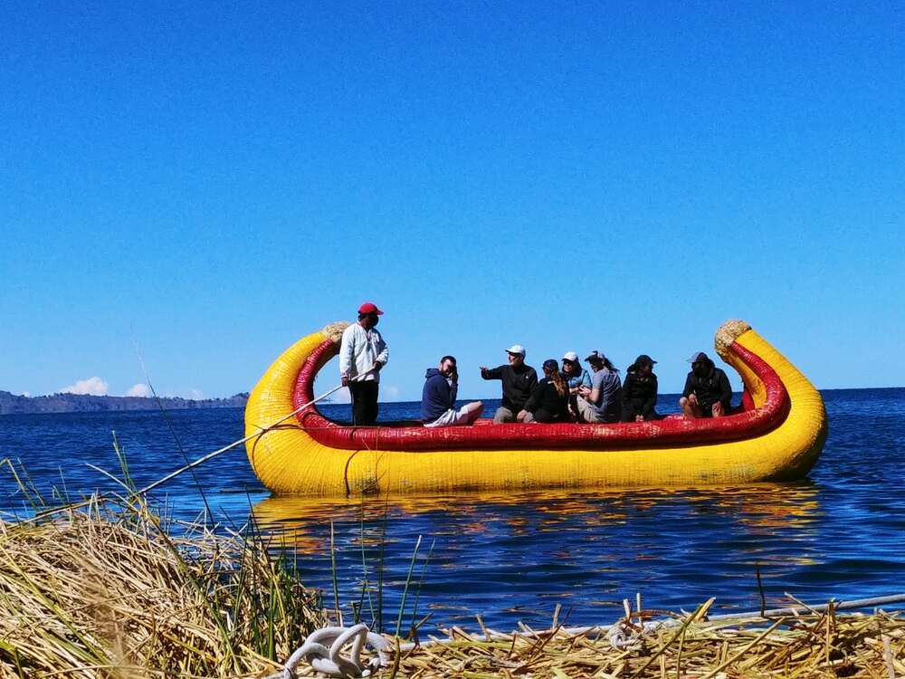 A colorful grass boat made by the Uros people on Lake Titicaca, Peru