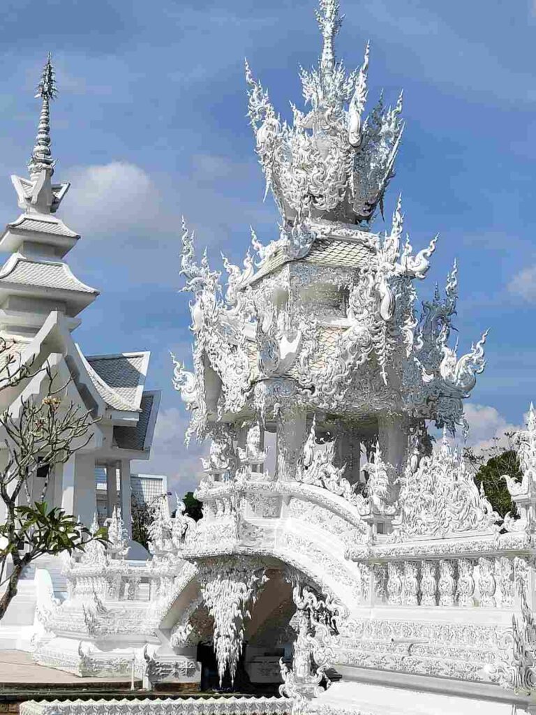 A photo of the back buildings of the White Temple in Chiang Rai