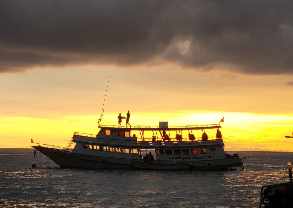 Watching Sunset on a boat in Koh Phi Phi, Thailand