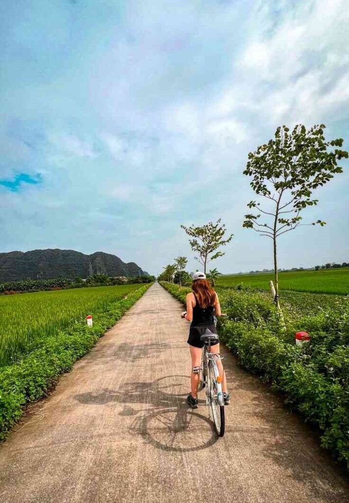 Riding through the rice paddies in Ninh Binh, Vietnam